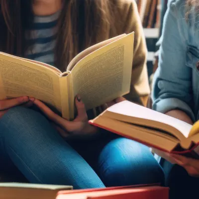 Group of people reading books